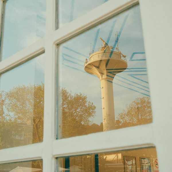 A serene landscape view through a window, symbolizing clarity and perspective.